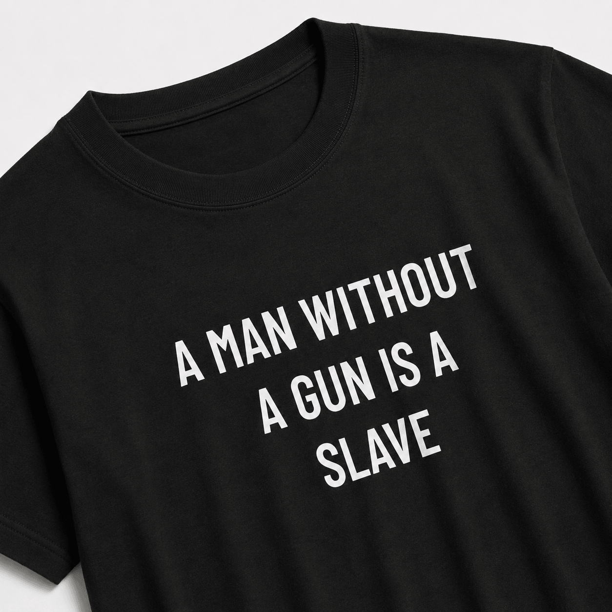 A MAN WITHOUT A GUN IS A SLAVE pro-gun statement t-shirt featured back | BASED ALT-WEAR
